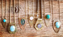 sunburst shield pendant