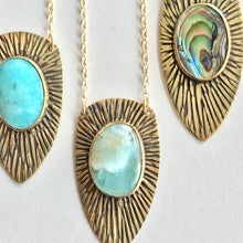 sunburst shield pendant