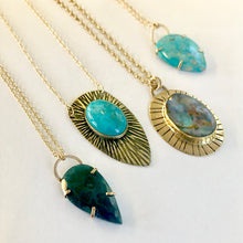 sunburst shield pendant